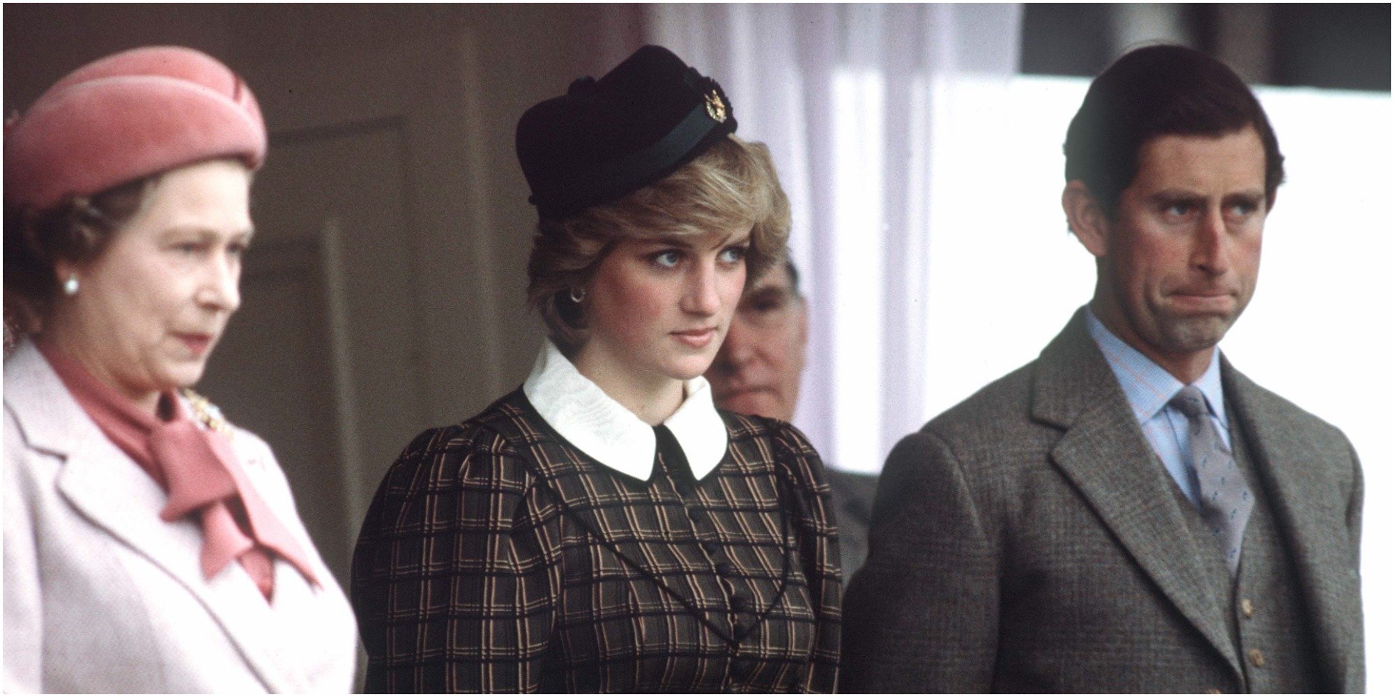 Prince Charles and Princess Diana in the midst of their marriage, ose for a photograph with Queen Elizabeth.