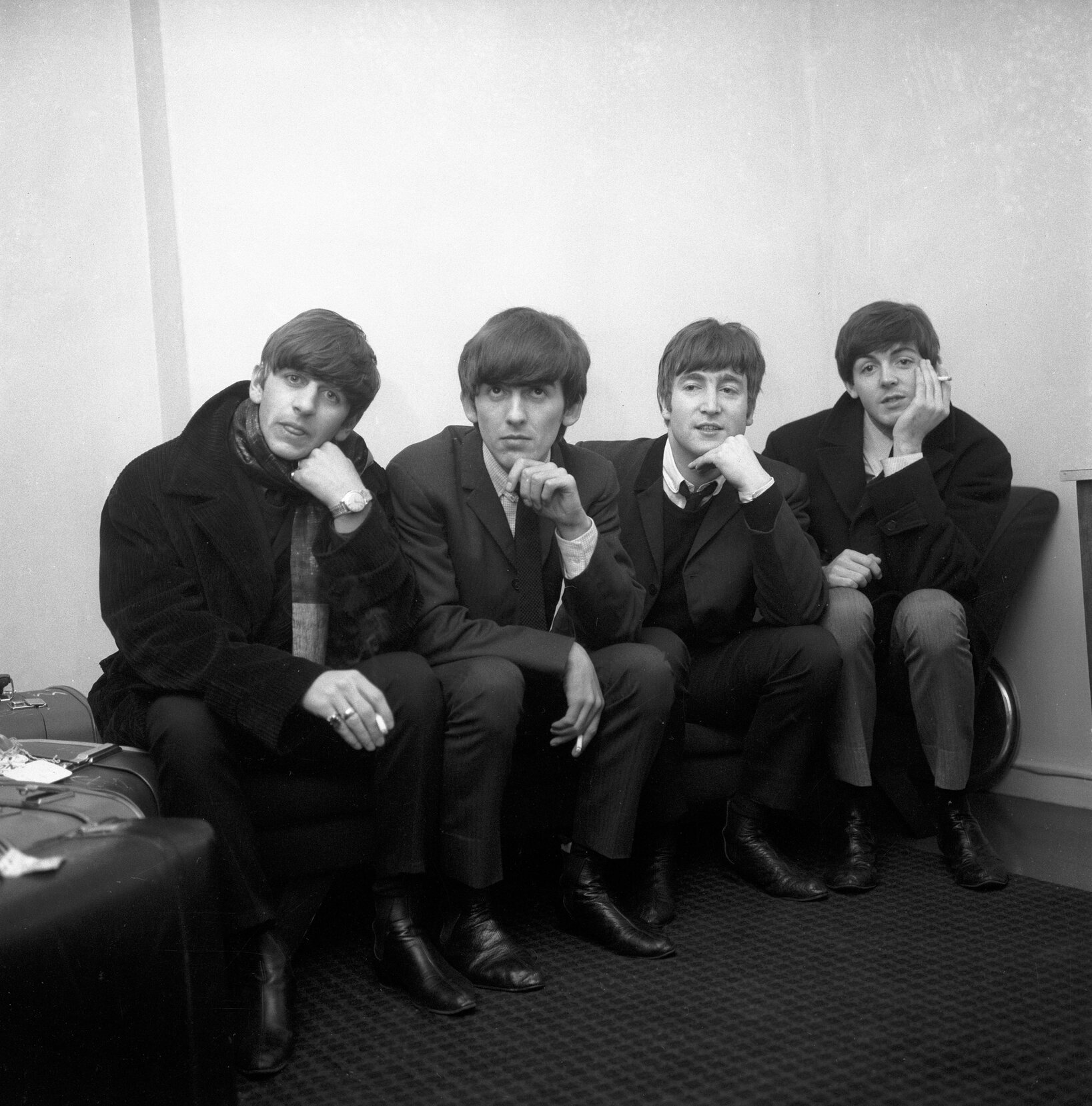 The Beatles, Ringo Starr, George Harrison (1943-2001), John Lennon (1940-1980), and Paul McCartney backstage at Guildhall on December 3, 1963 in Portsmouth, England, United Kingdom