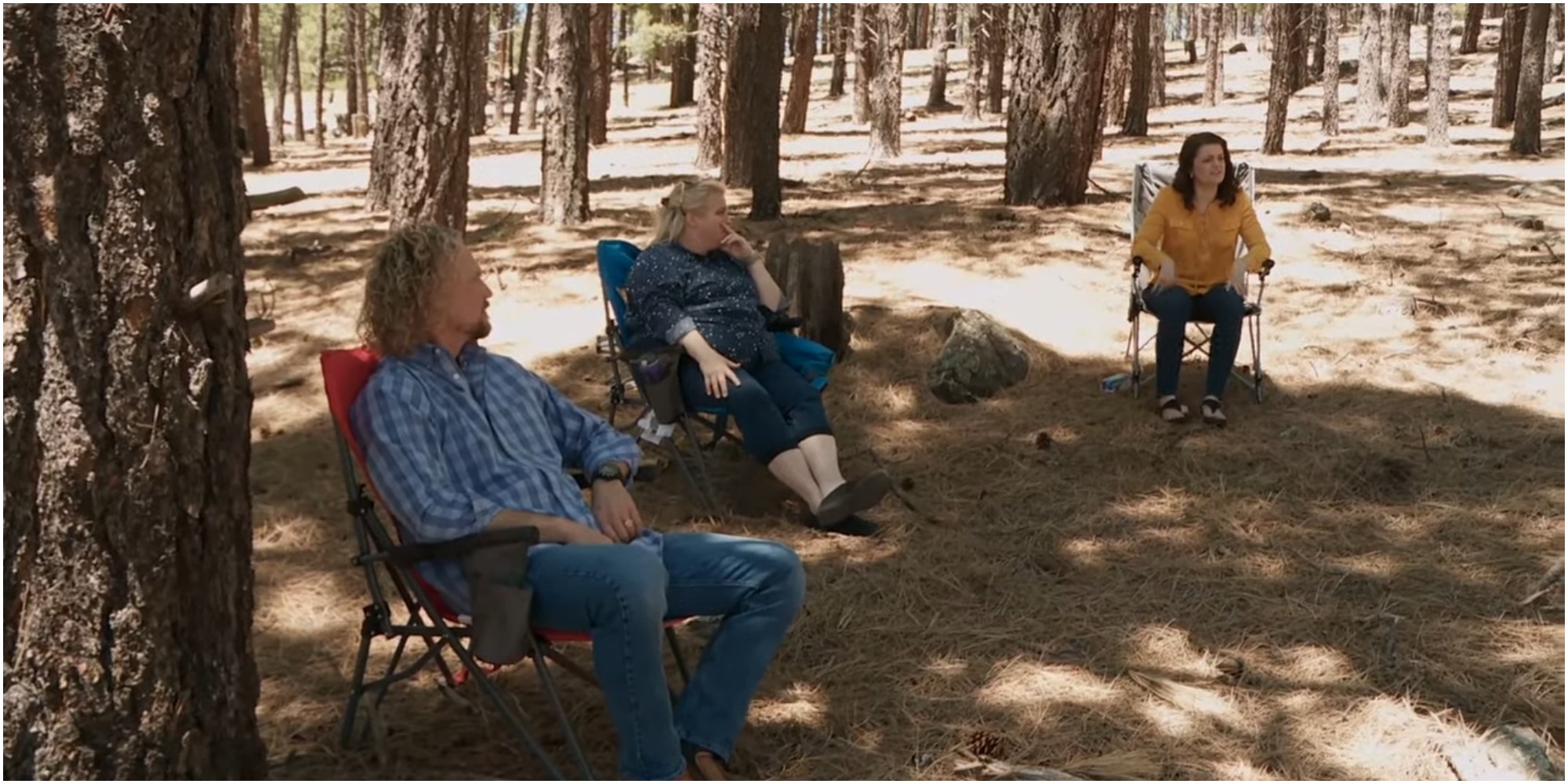 Kody, Janelle and Robyn Brown are seated at Coyote Pass on Sister Wives.