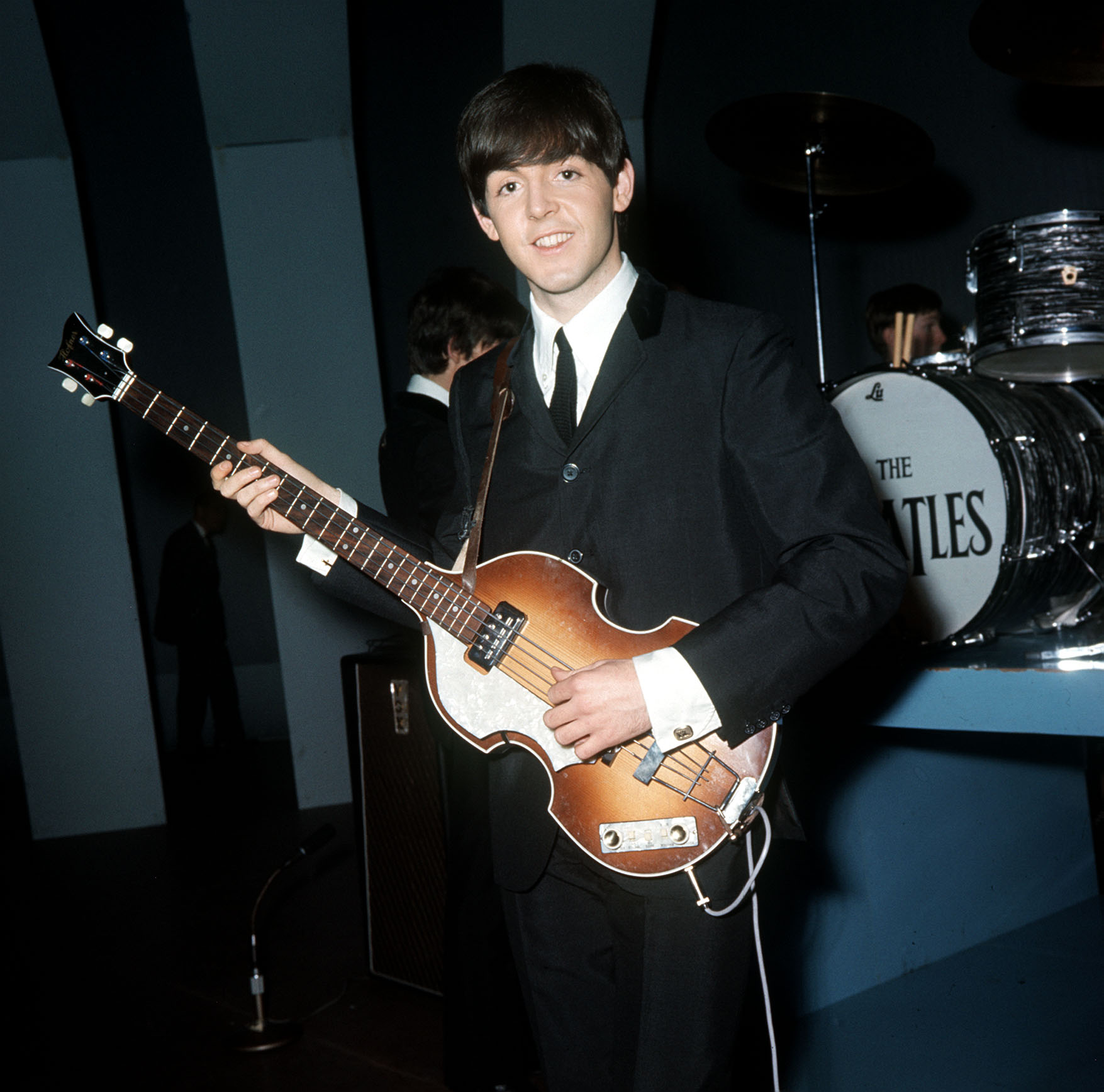 The Beatles' Paul McCartney with a drum