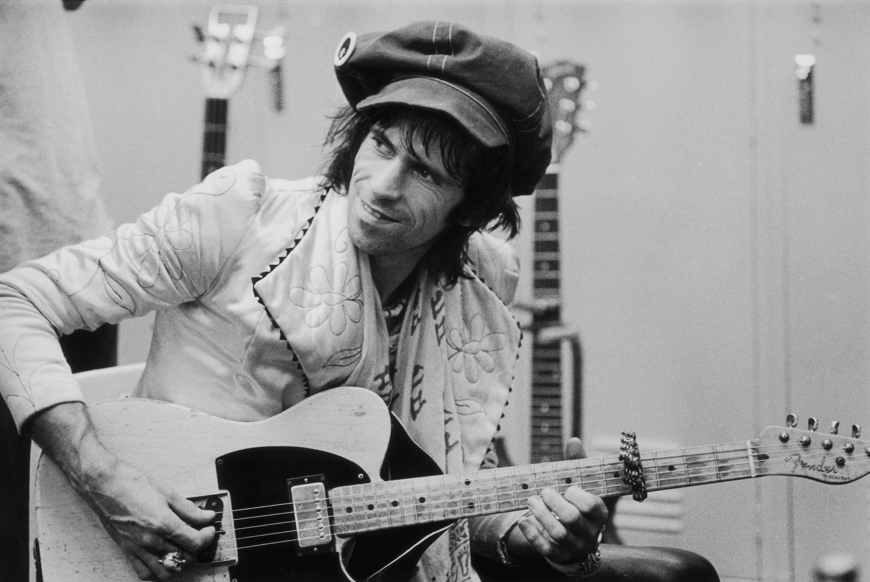 The Rolling Stones' Keith Richards holding a guitar