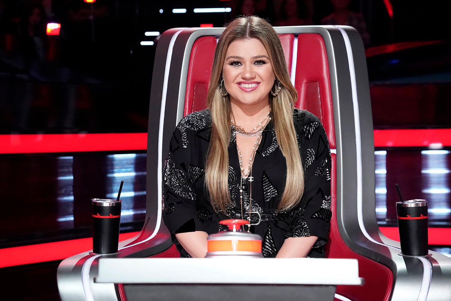 Kelly Clarkson sits in her chair on The Voice Season 21 Episode 11