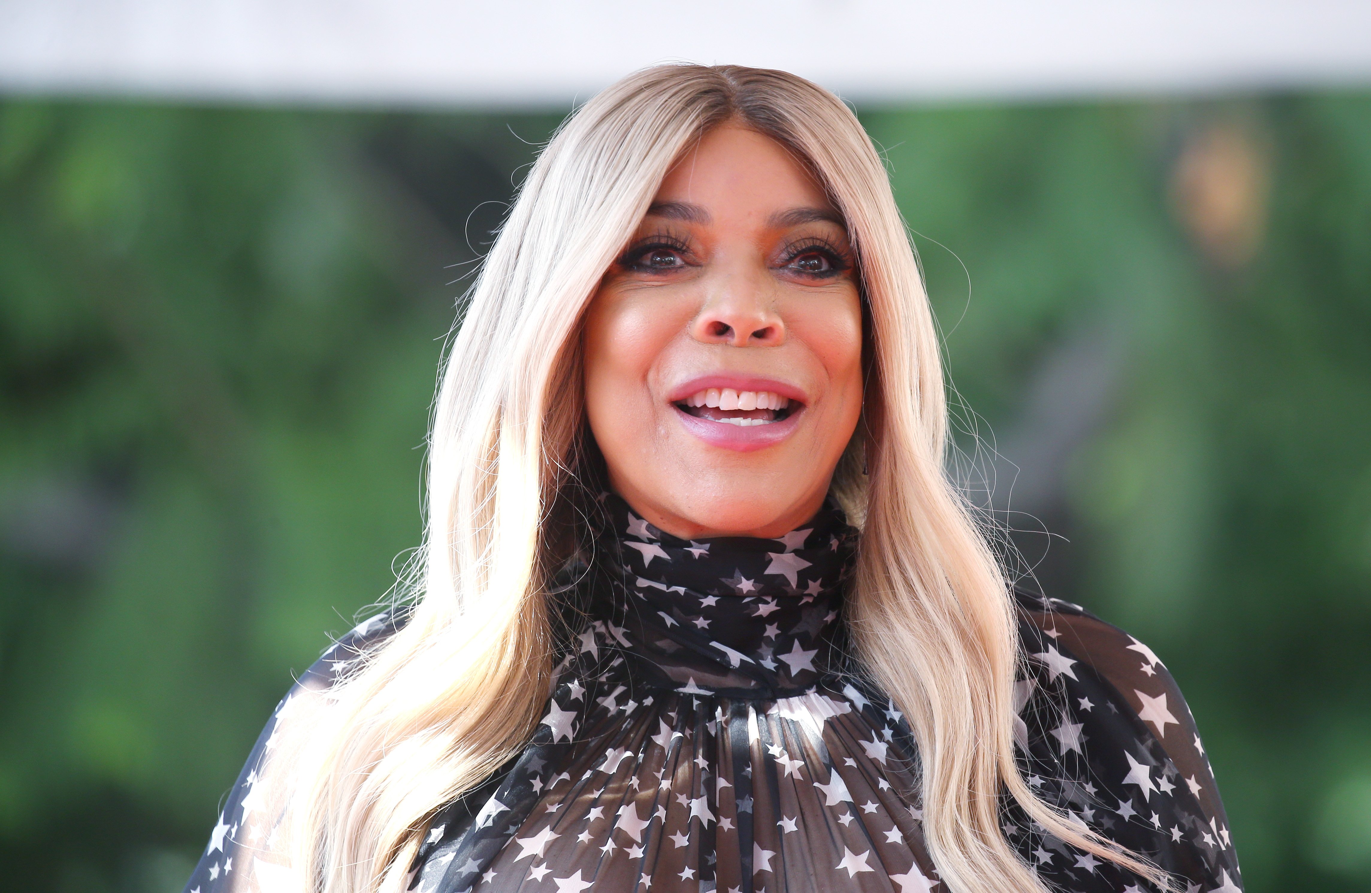 Wendy Williams smiles