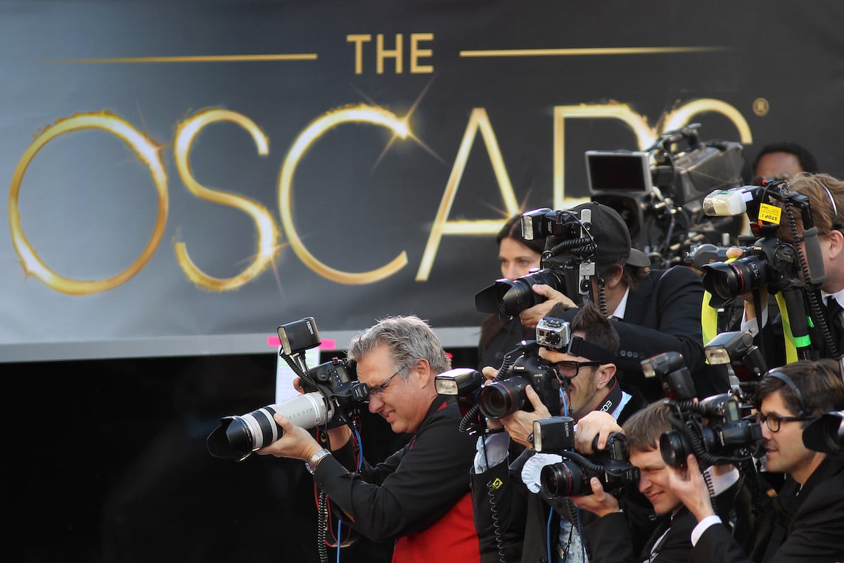 At the 85th Annual Academy Awards, photographers cover the red-carpet arrivals at the Hollywood & Highland Center on February 24, 2013, in Hollywood, California