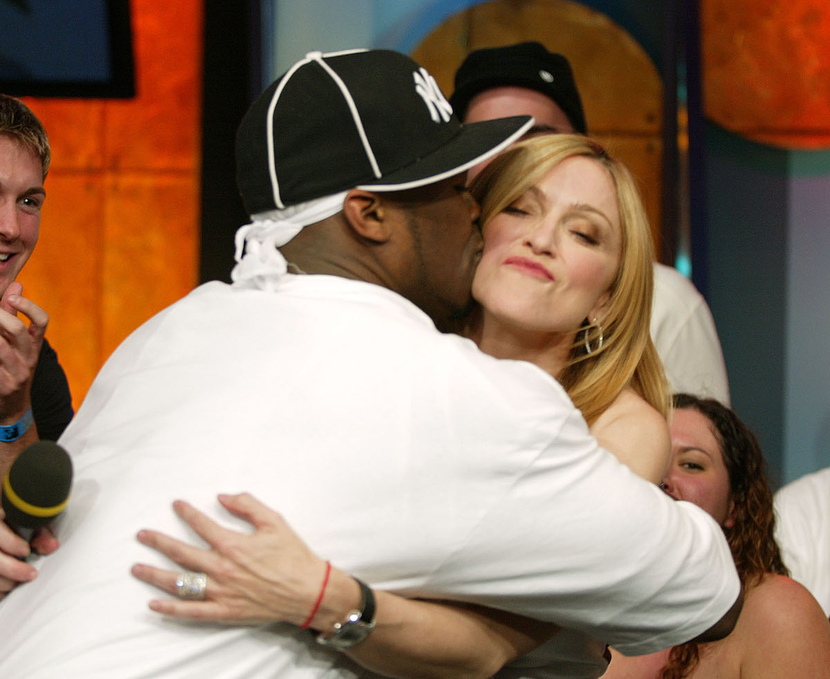 50 Cent and Madonna hug.