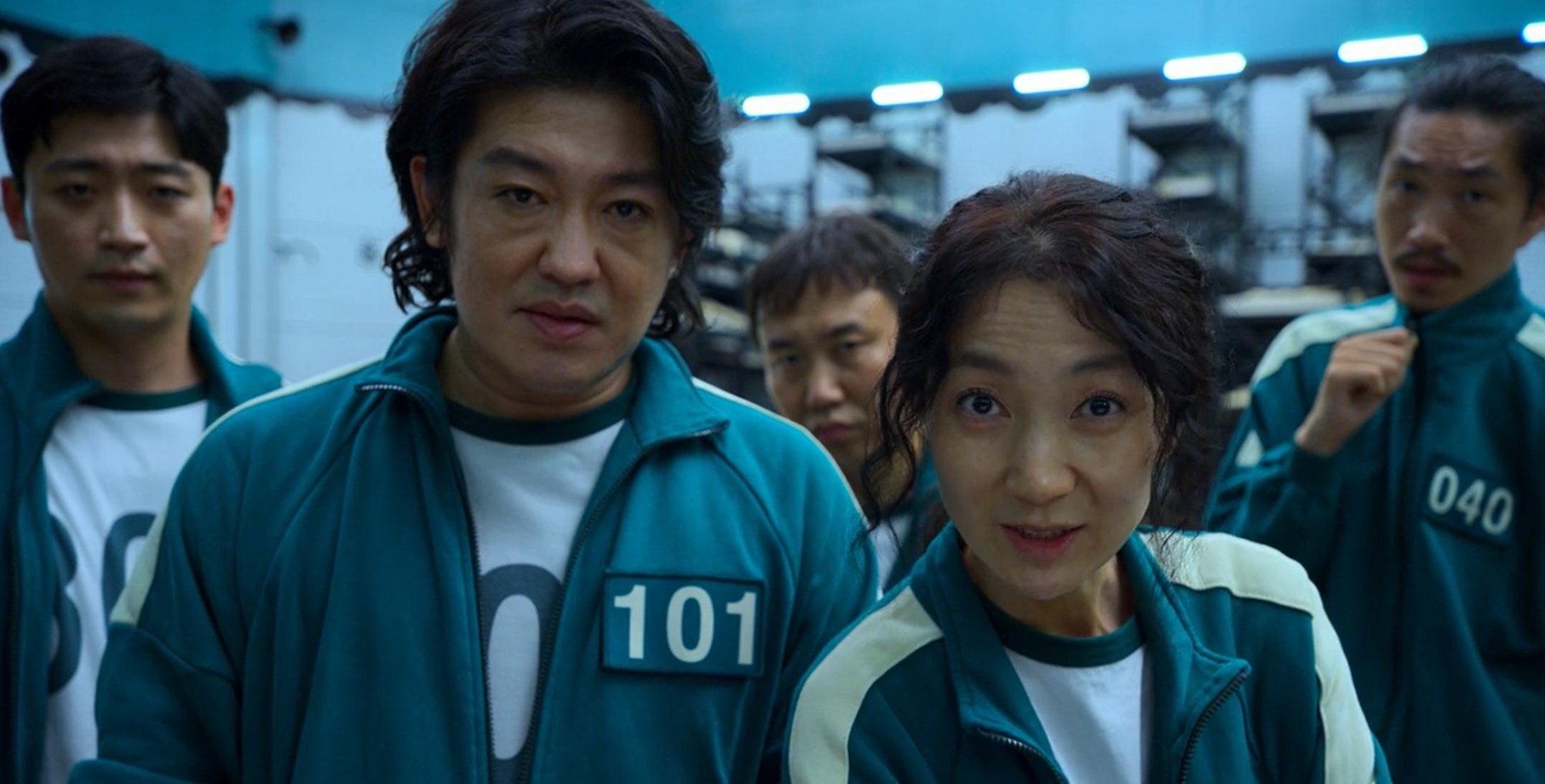 Actors Kim Joo-ryoung and Heo Sung-tae in 'Squid Game' wearing track suits in relation to sex scene.