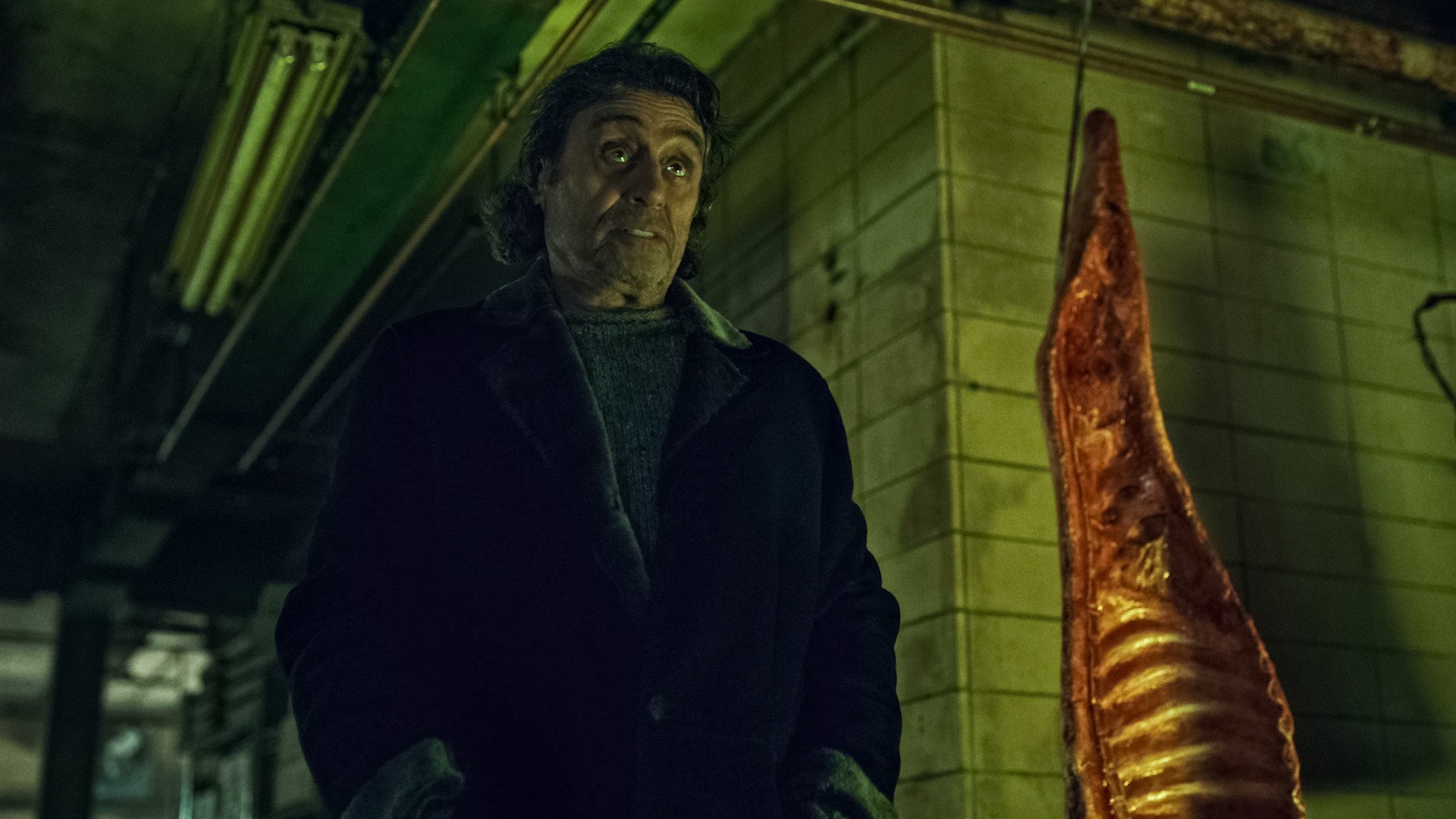 Ian McShane as Mr. Wednesday, wearing a dark coat, in 'American Gods', one of 2021's canceled TV shows.