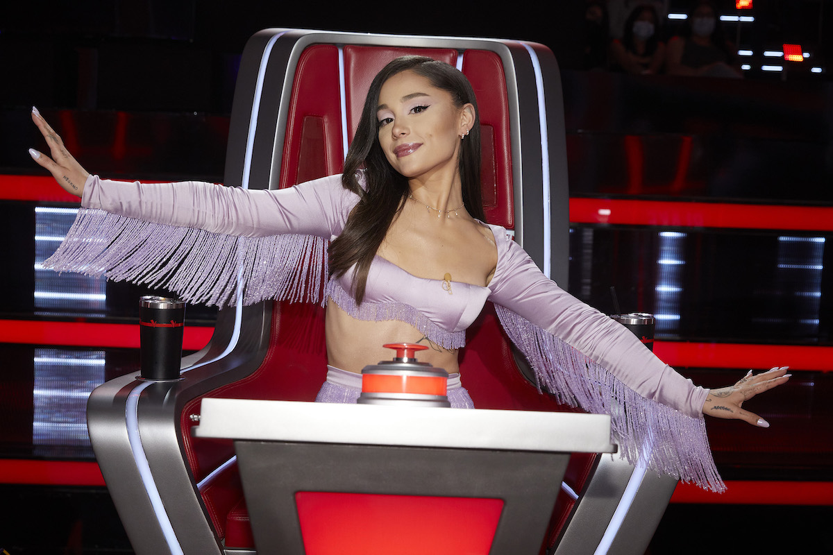 Ariana Grande poses on the set of "The Voice."