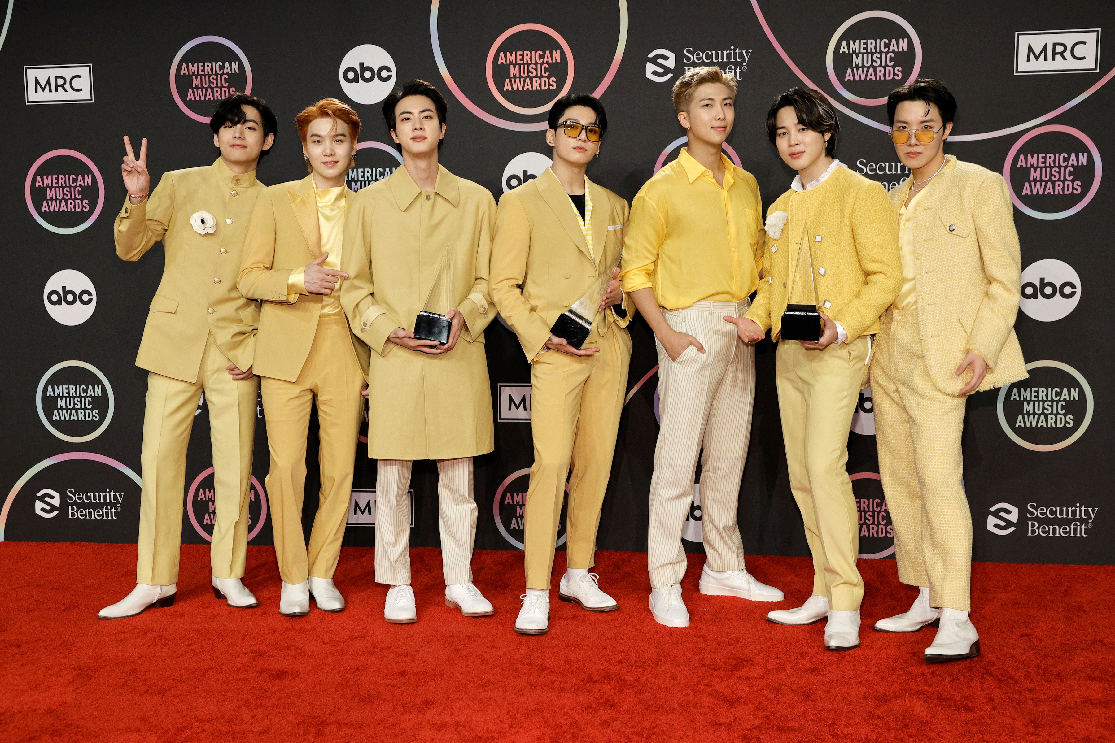 V, Suga, Jin, Jungkook, RM, Jimin, and J-Hope of BTS, winners of the Favorite Pop Song, Favorite Pop Duo or Group, and Artist of the Year American Music Awards
