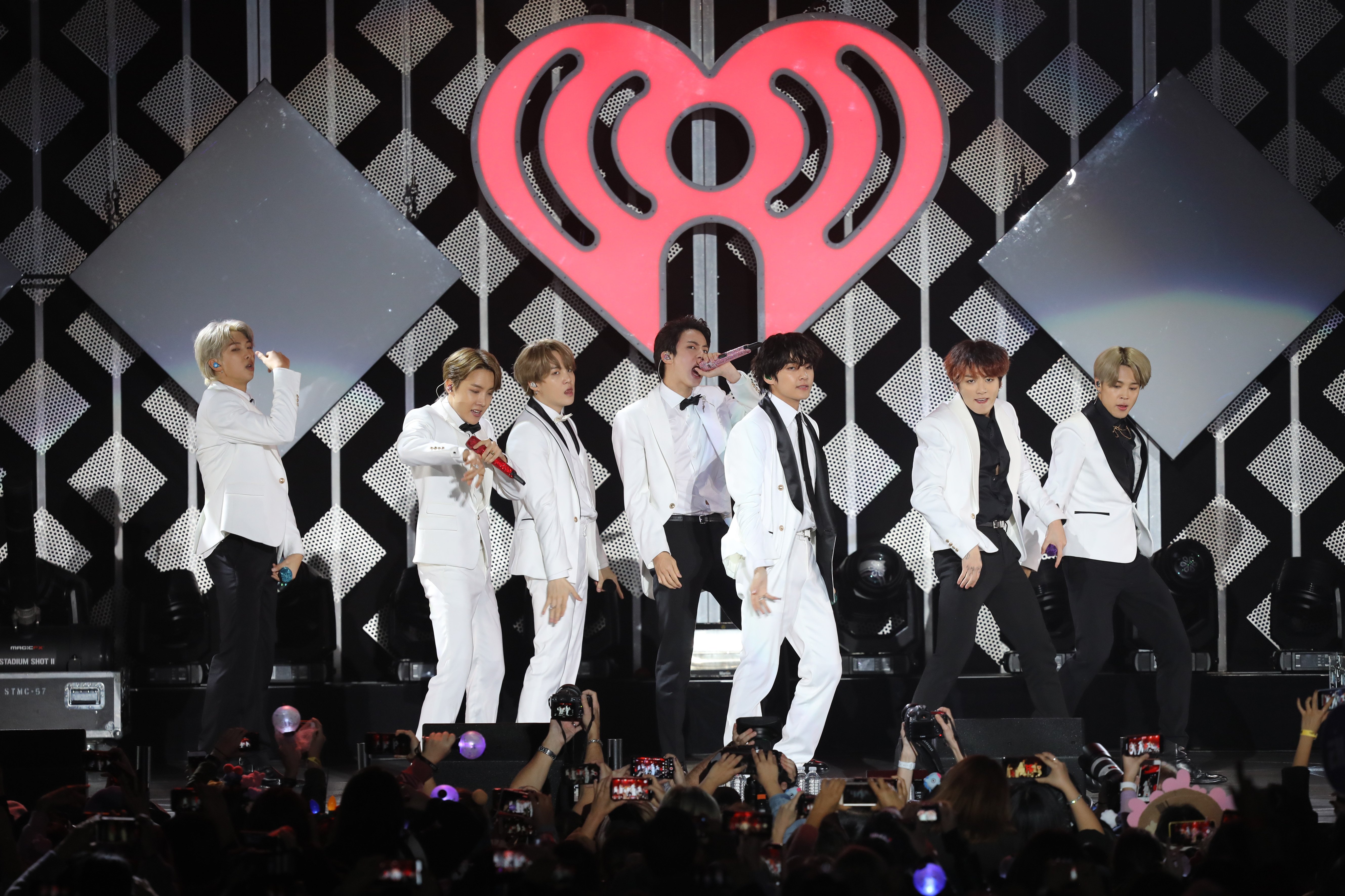 V, Suga, Jin, Jungkook, RM, Jimin, and J-Hope of BTS performs during the iHeartRadio KIIS FM's Jingle Ball