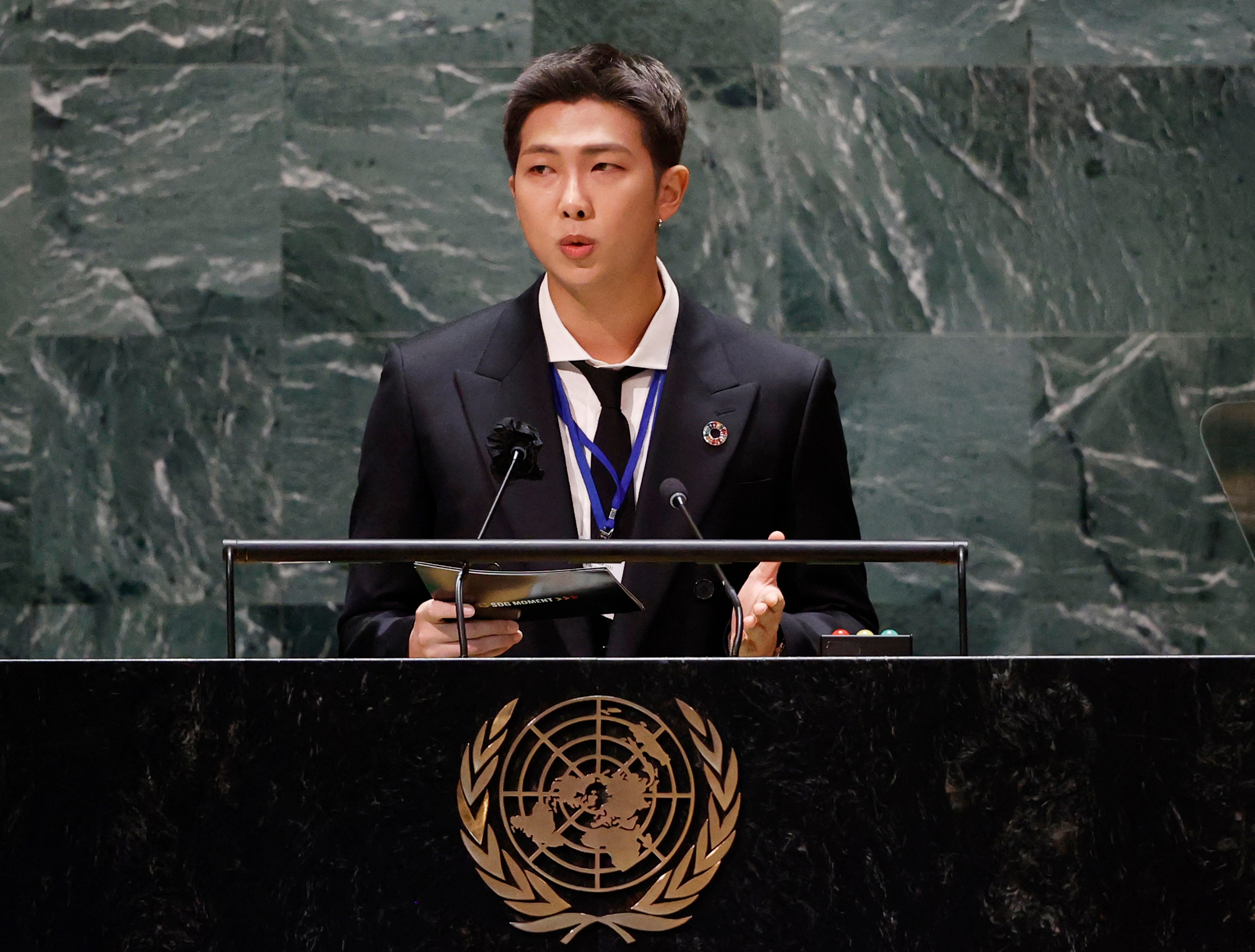 RM of BTS speaks with other members of the band at the SDG Moment event as part of the UN General Assembly 76th session General Debate at United Nations Headquarters