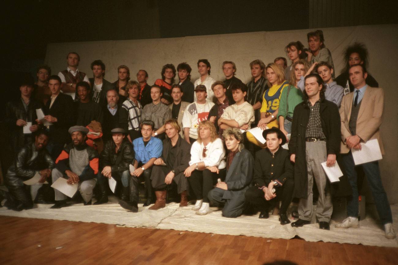 The members of Band Aid posing for a group photo after they recorded their Christmas song 'Do They Know It's Christmas' in 1984.