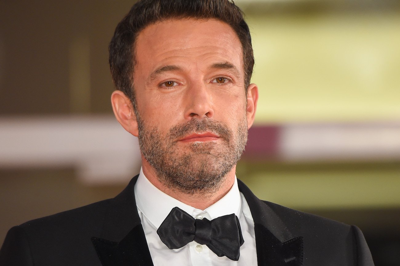 Ben Affleck looks on as he wears a tuxedo to the premiere of 'The Last Duel' at the Venice International Film Festival