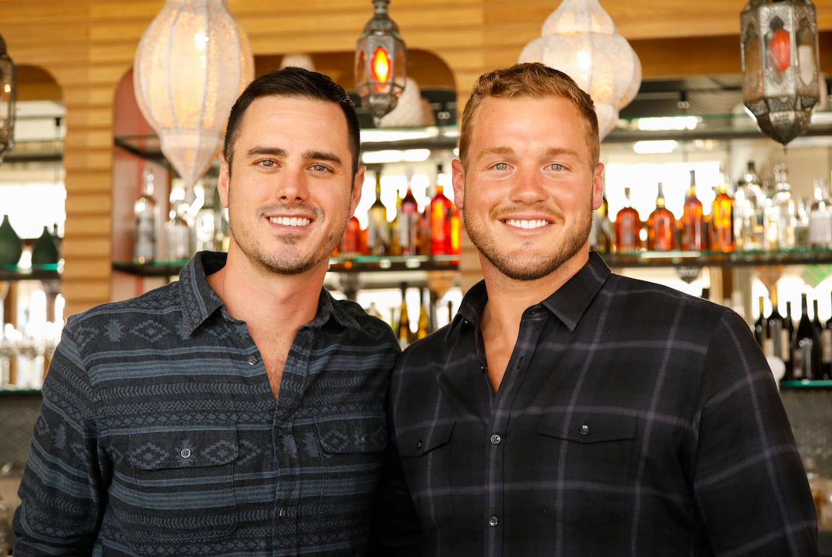 Ben Higgins and Colton Underwood smile and pose together.