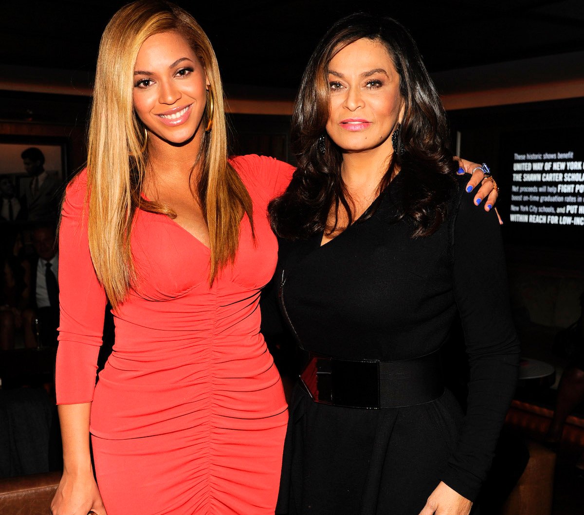 Beyonce and Tina Knowles-Lawson smile and pose together
