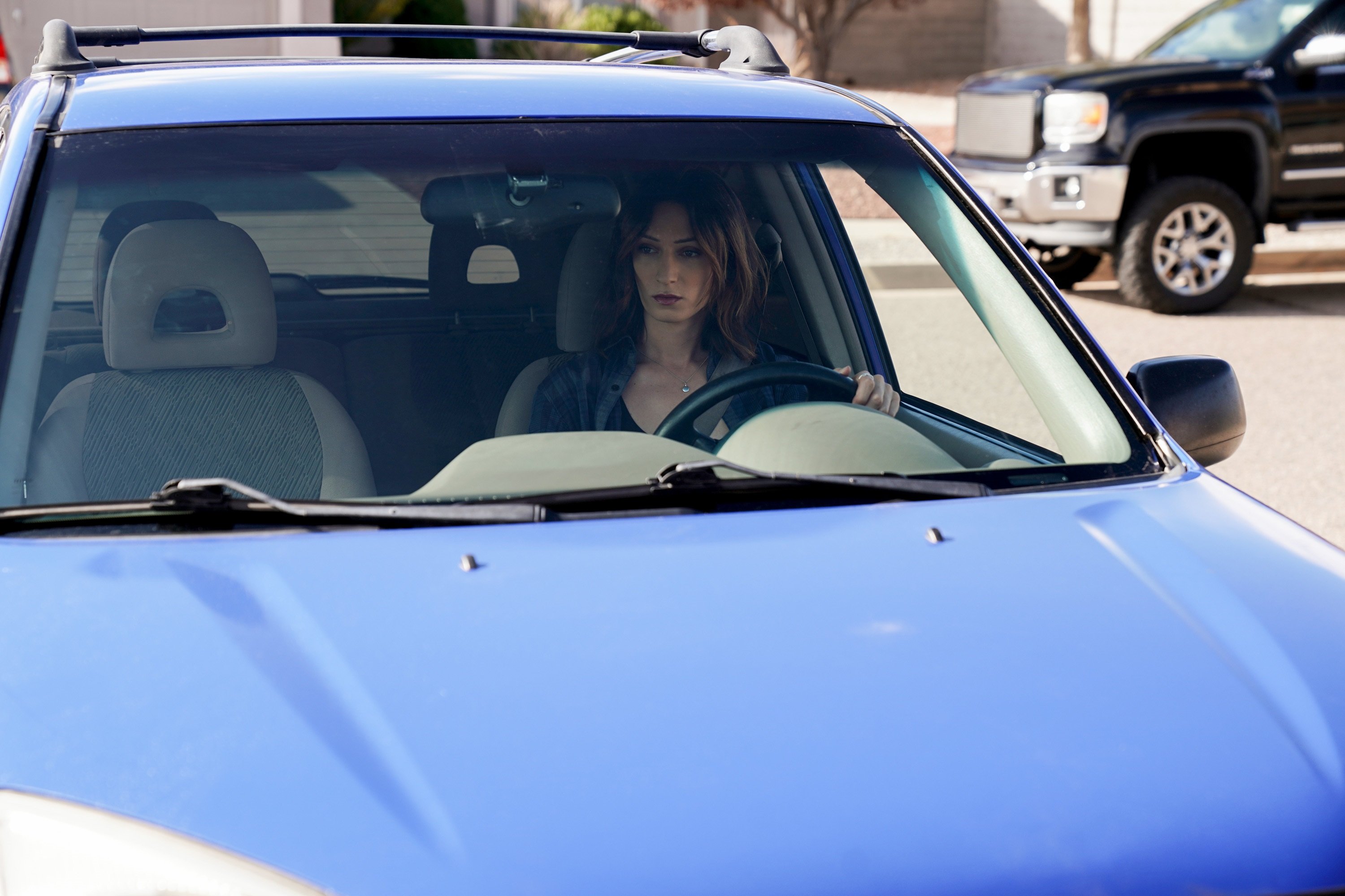 Jesse James Keitel driving in a car as Jerrie Kennedy in 'Big Sky'