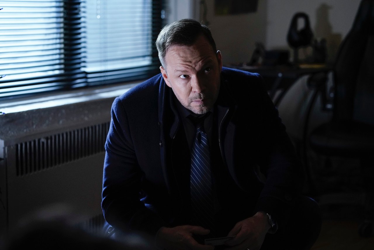 Donnie Wahlberg on 'Blue Bloods' looks up in a dark room.