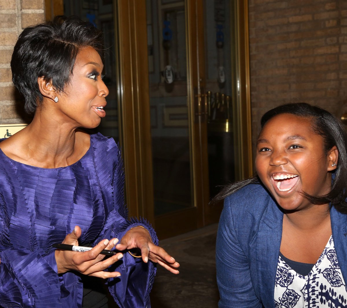 Brandy and her daughter Sy'Rai smile together