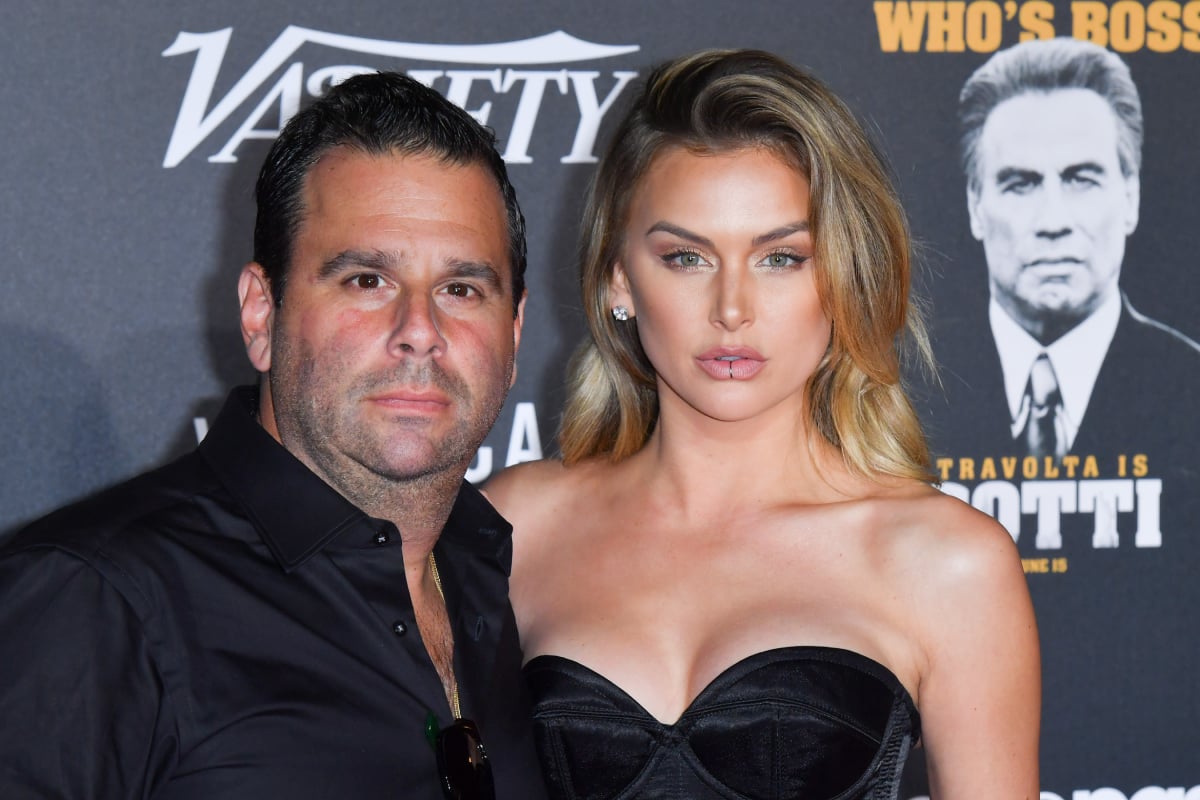 Randall Emmett and Lala Kent, one of 2021's Bravo breakups, pose together in black formal attire 