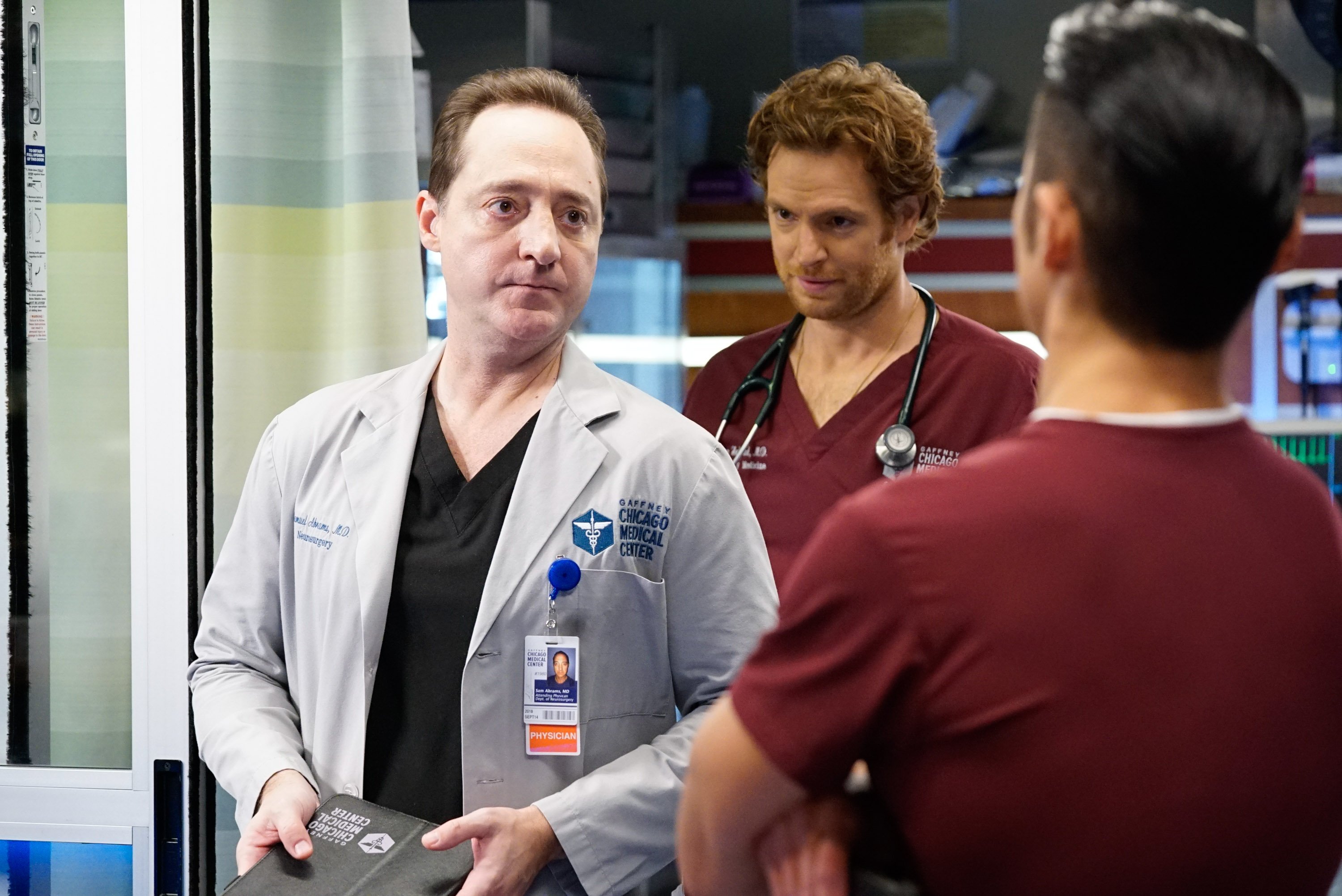 Brennan Brown as Dr. Sam Abrams, Nick Gehlfuss as Dr. Will Halstead and Brian Tee as Ethan Choi in Chicago Med. Will Abrams appear in the Chicago Med Season 7 fall finale?