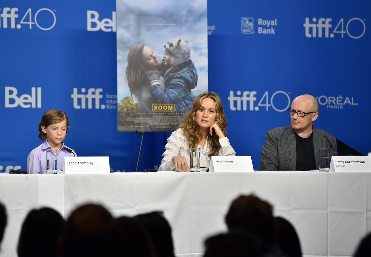 Actors Jacob Tremblay and Brie Larson speak onstage during the 'Room' press conference in 2015