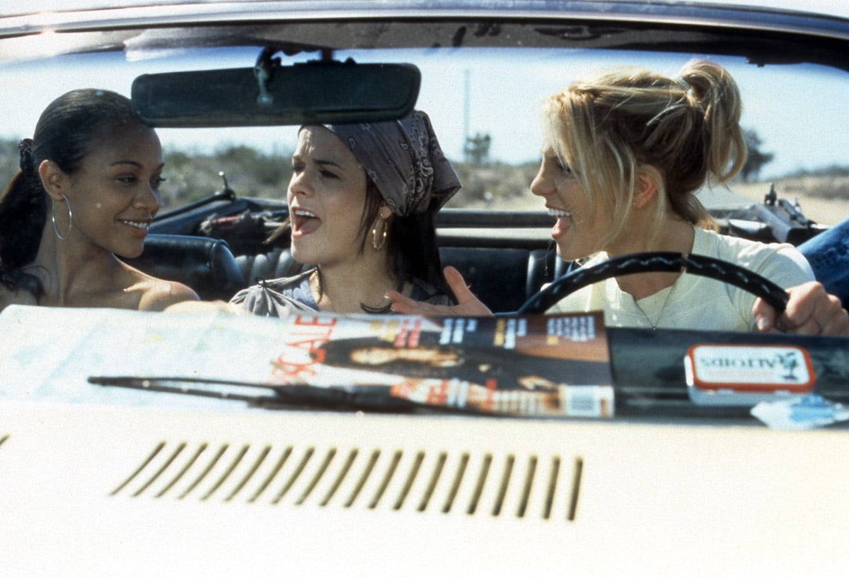 Britney Spears' Crossroads cast including Zoe Saldana and Taryn Manning in a car