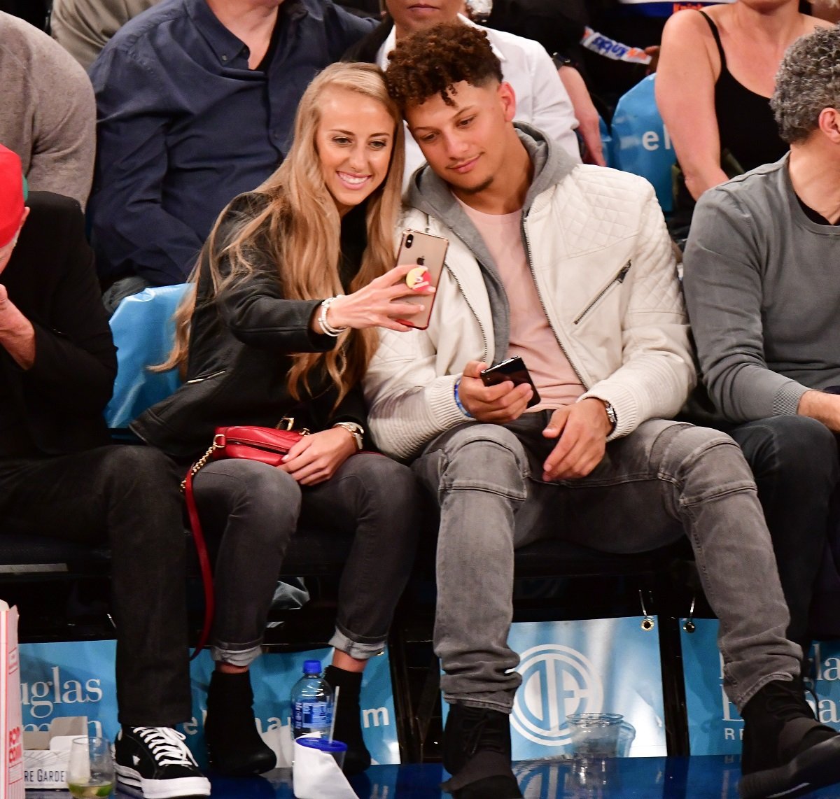 Brittany Matthews and Patrick Mahomes taking a selfie during an NBA game at Madison Square Garden