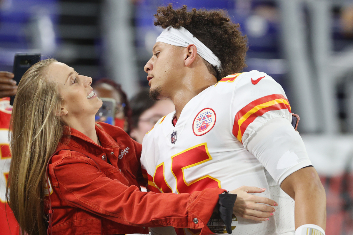 Patrick Mahomes #15 of the Kansas City Chiefs greets his fiancé Brittany Matthews prior to the game against the Baltimore Ravens at M&T Bank Stadium on September 19, 2021
