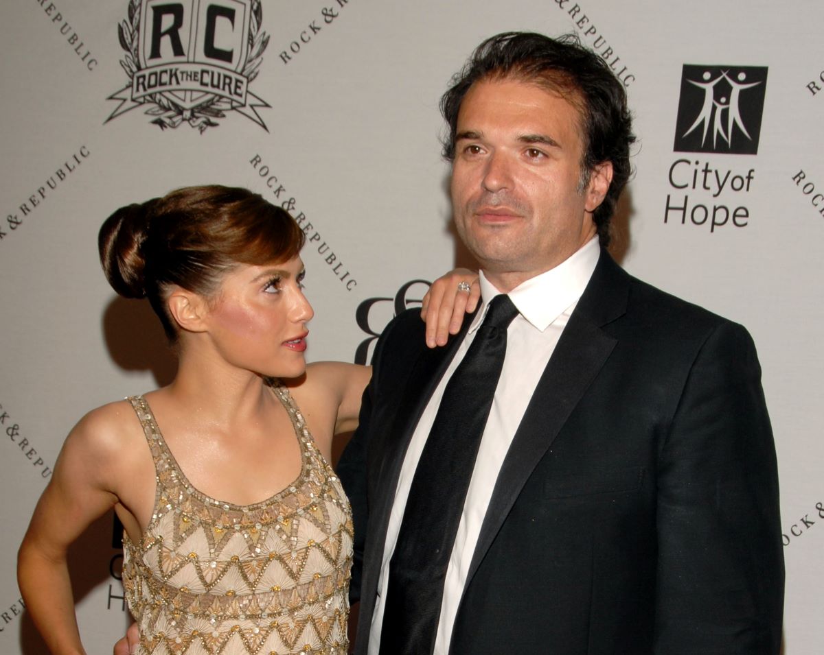 Late actor Brittany Murphy looks up at her husband, late filmmaker Simon Monjack, with one hand rested on his shoulder