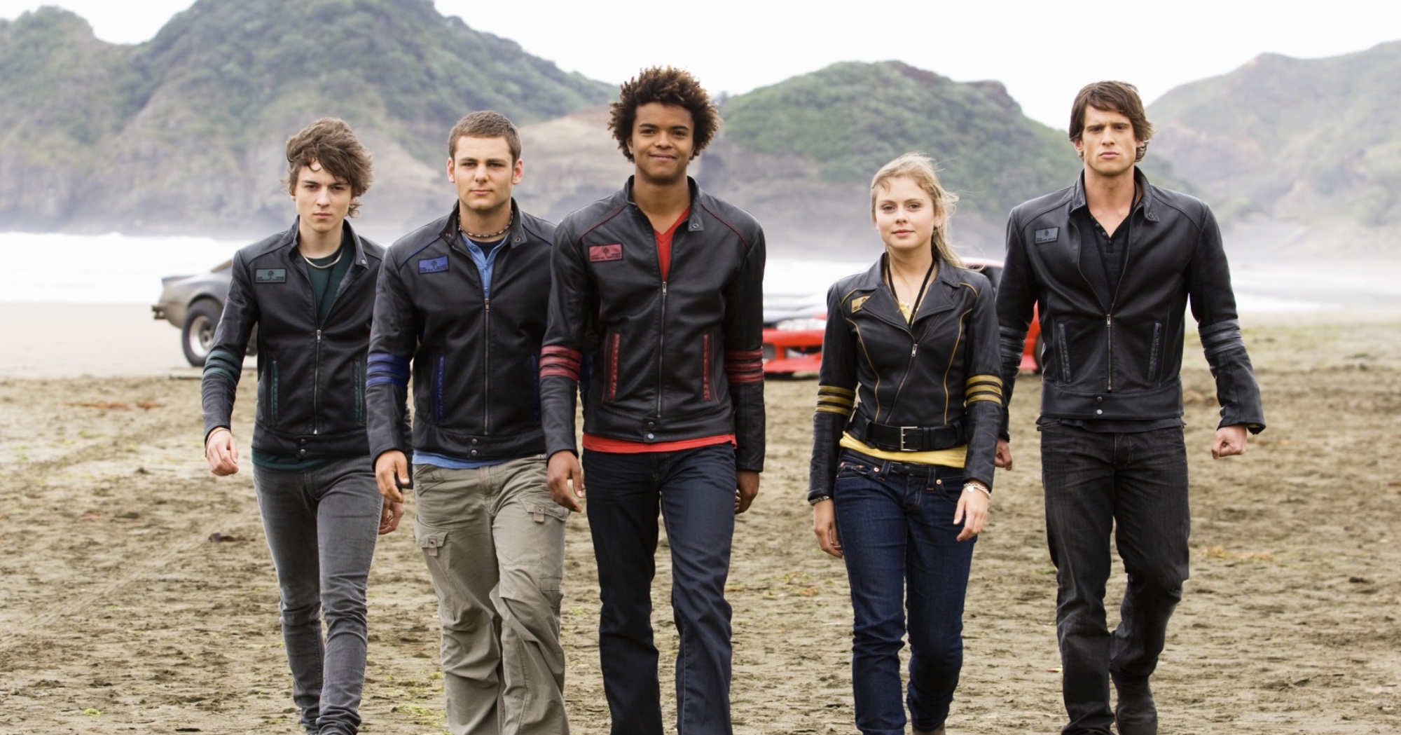 Cast members and Rose McIver for 'Power Rangers RPM' wearing team jackets