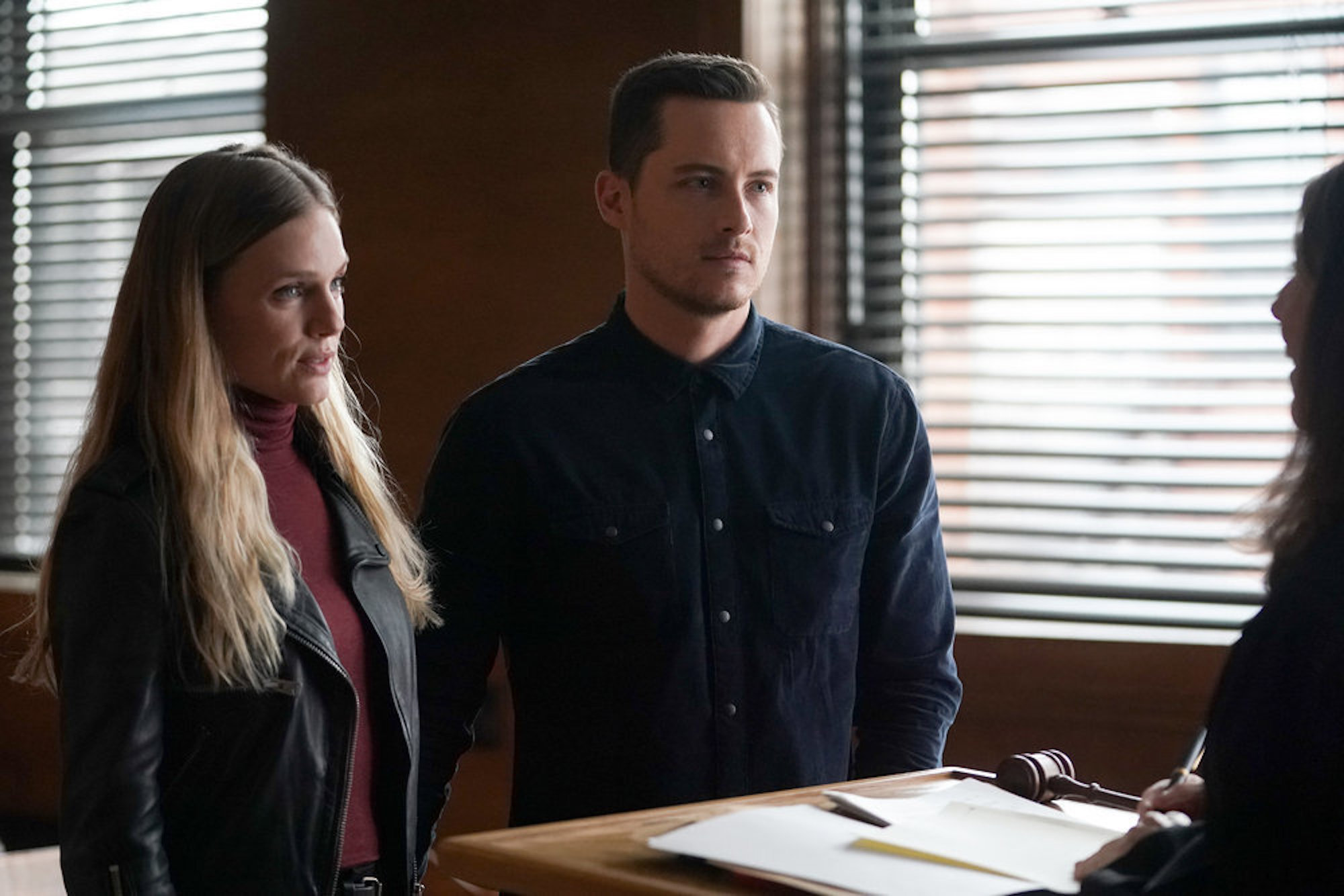 Jay Halstead and Hailey Upton standing at the courthouse in 'Chicago P.D.' Season 9 Episode 9