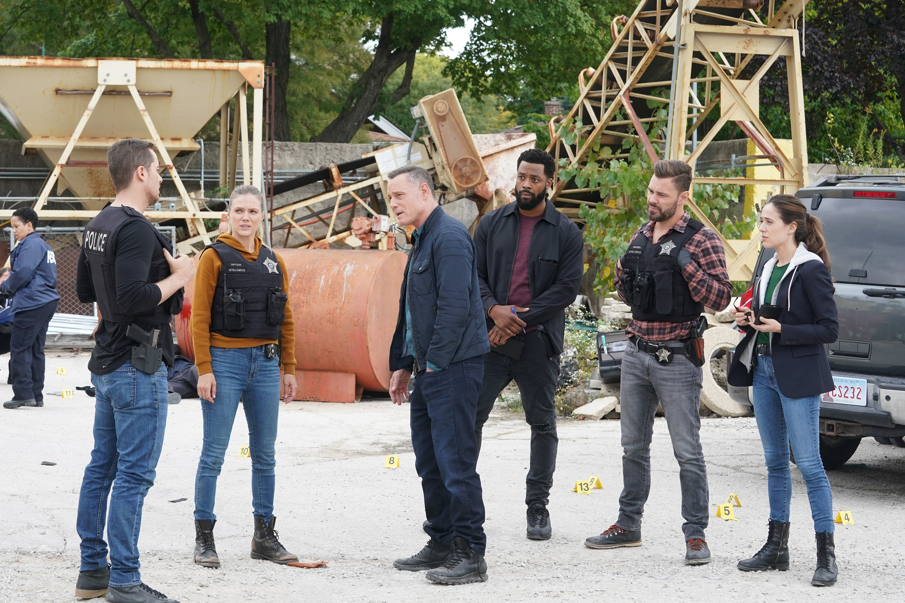 Jesse Lee Soffer as Jay Halstead, Tracy Spiridakos as Hailey, Jason Beghe as Hank Voight, LaRoyce Hawkins as Kevin Atwater, Patrick John Flueger as Adam Ruzek, and Marina Squerciati as Kim Burgess in Chicago P.D.'