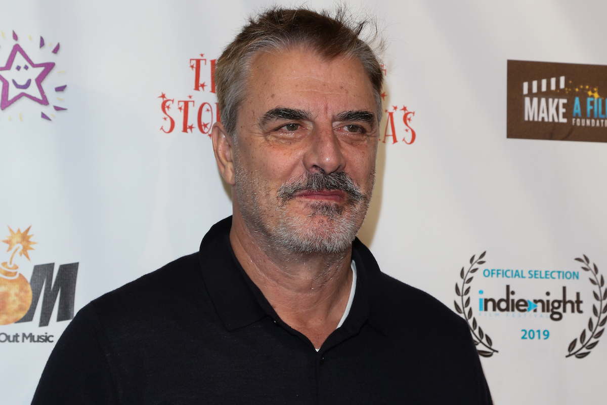 Chris Noth poses at an event.