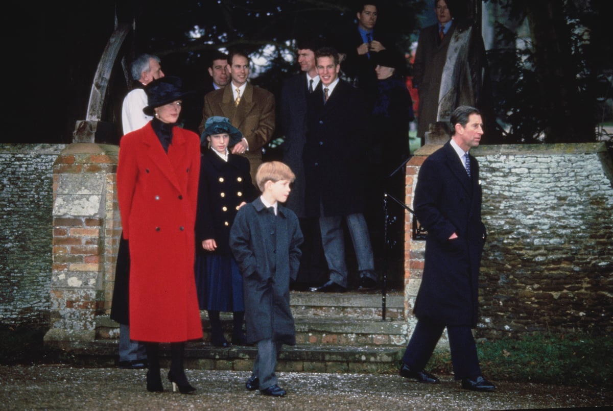 British royals Diana, Princess of Wales wears a red coat with a black hat; Zara Phillips; Prince Andrew, Duke of York; Prince Edward; Peter Phillips; and Prince Charles attend the Christmas Day church service at St. Mary Magdalene Church in Sandringham, Norfolk, England on December 25, 1993