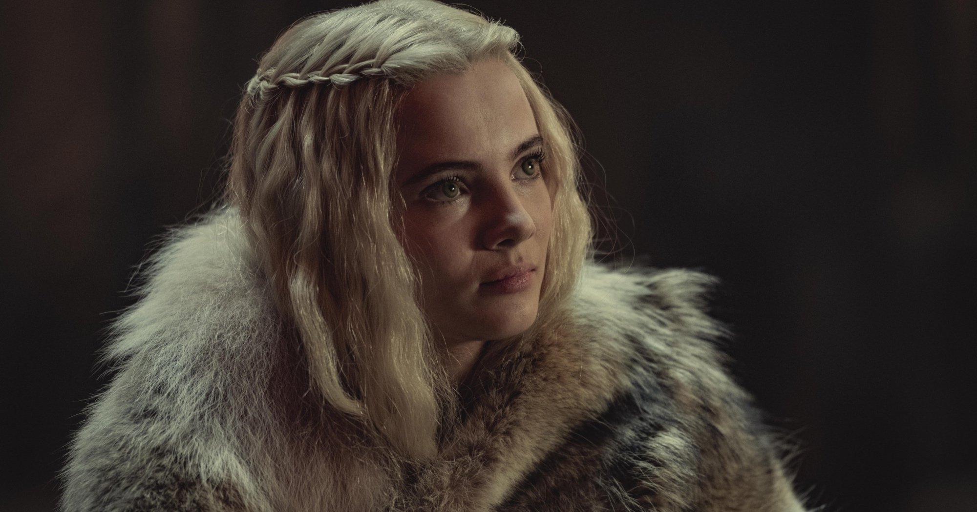 Ciri from 'The Witcher' Season 2 still wearing white fur coat.