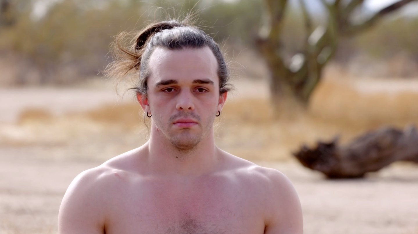 '90 Day Fiancé: Before the 90 Days' Season 5 cast member Caleb seen here meditating in the desert without a shirt on.