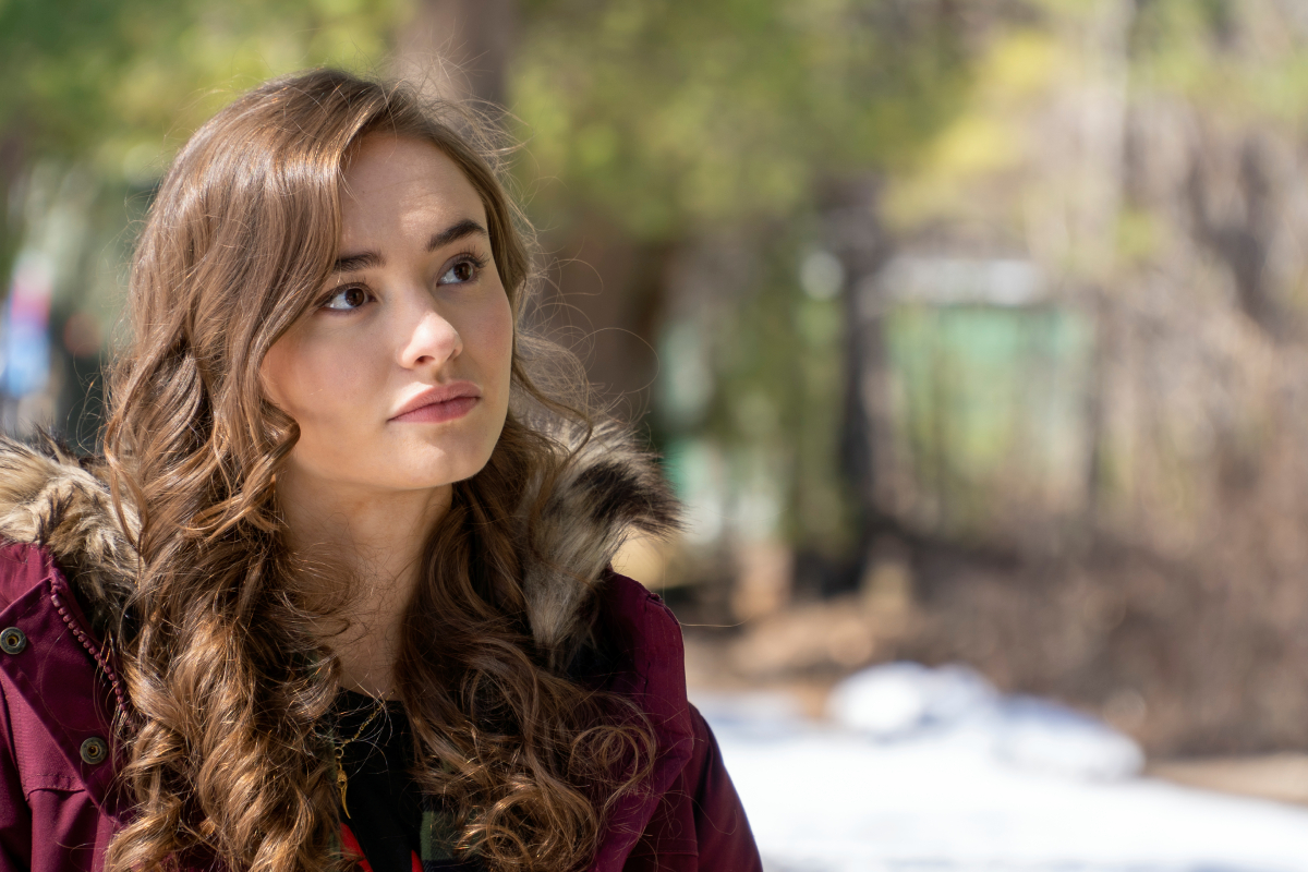 Johnny Sequoyah as Audrey in Dexter: New Blood. Audrey is wearing a maroon coat.