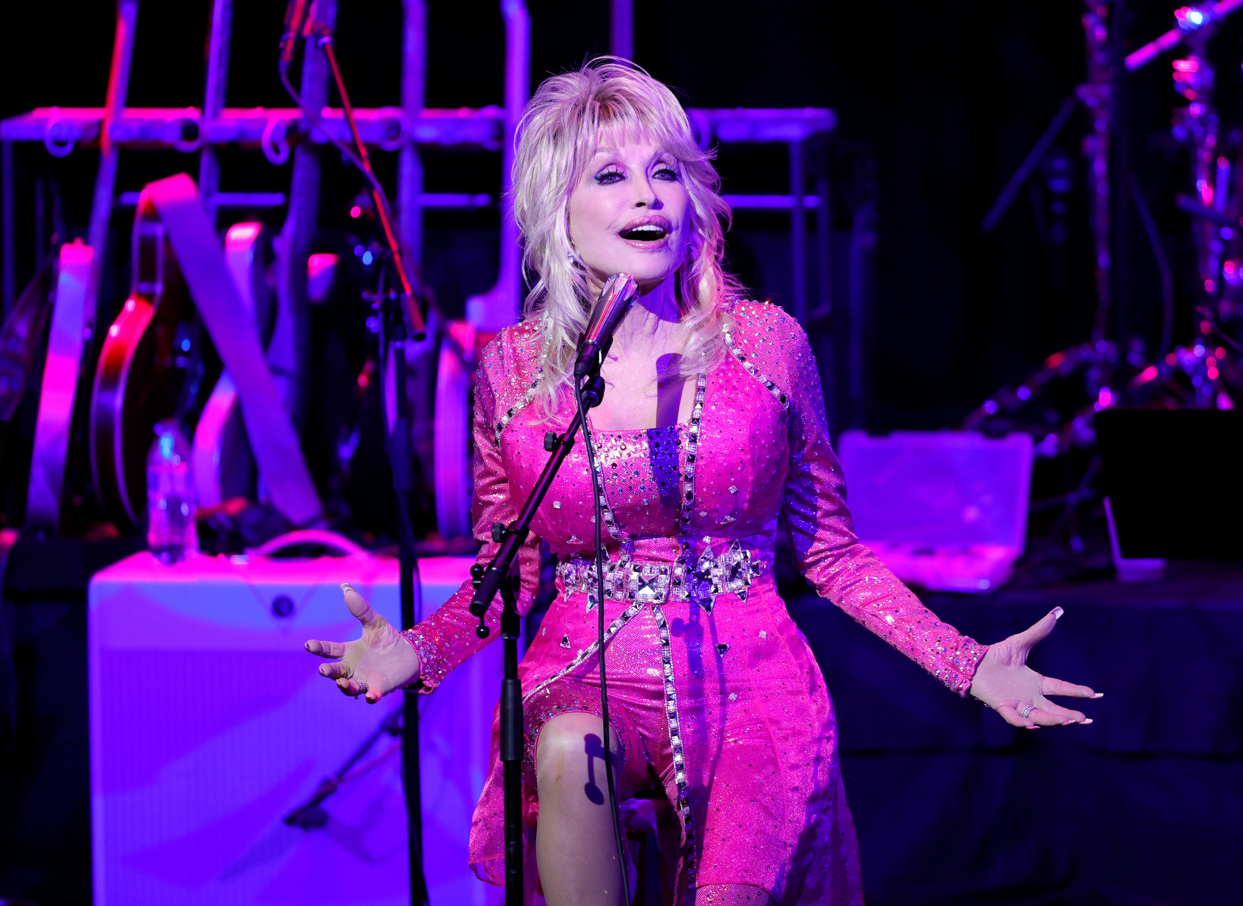 Dolly Parton performs at the 2021 Kiss Breast Cancer Goodbye Concert at CMA Theater at the Country Music Hall of Fame and Museum