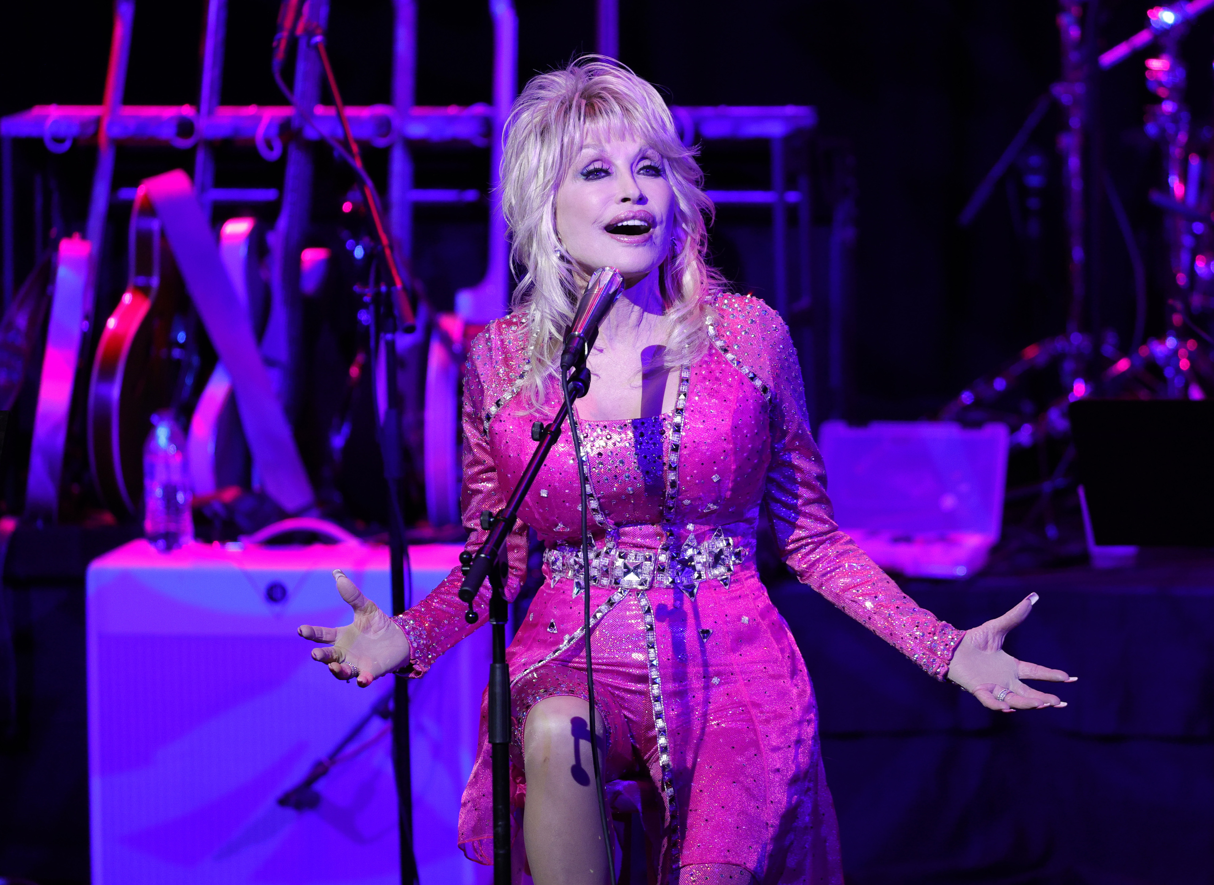 Dolly Parton performs at the 2021 Kiss Breast Cancer Goodbye Concert at CMA Theater at the Country Music Hall of Fame and Museum