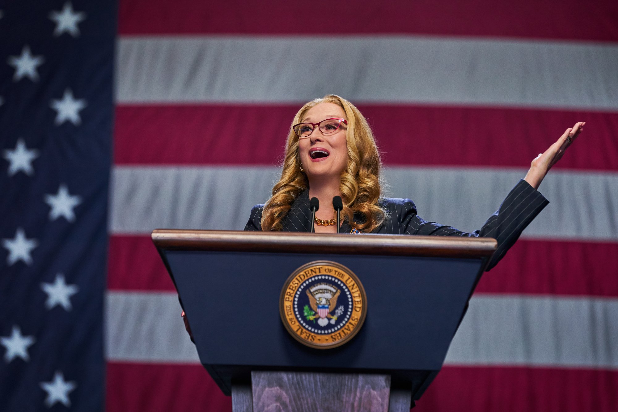 'Don't Look Up' post-credits featuring Meryl Streep as President Janie Orlean standing behind a podium with the American flag behind her