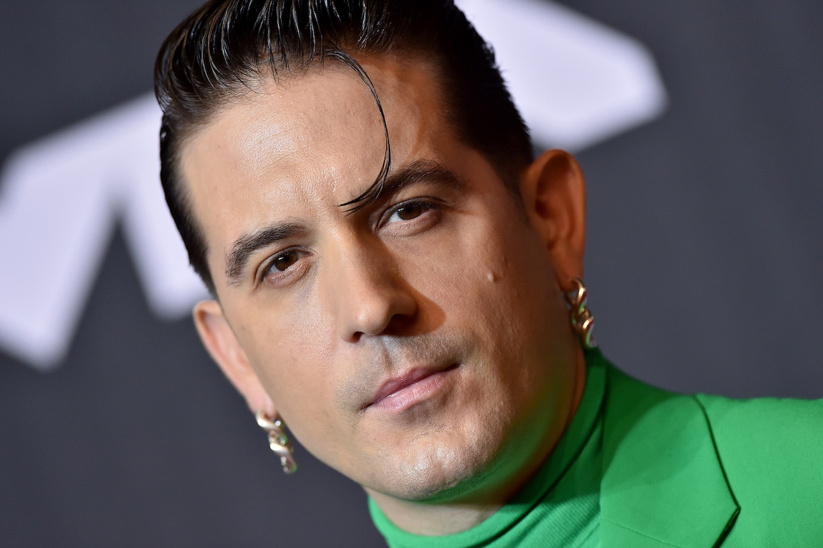 Close up of G-Eazy's face at an event.
