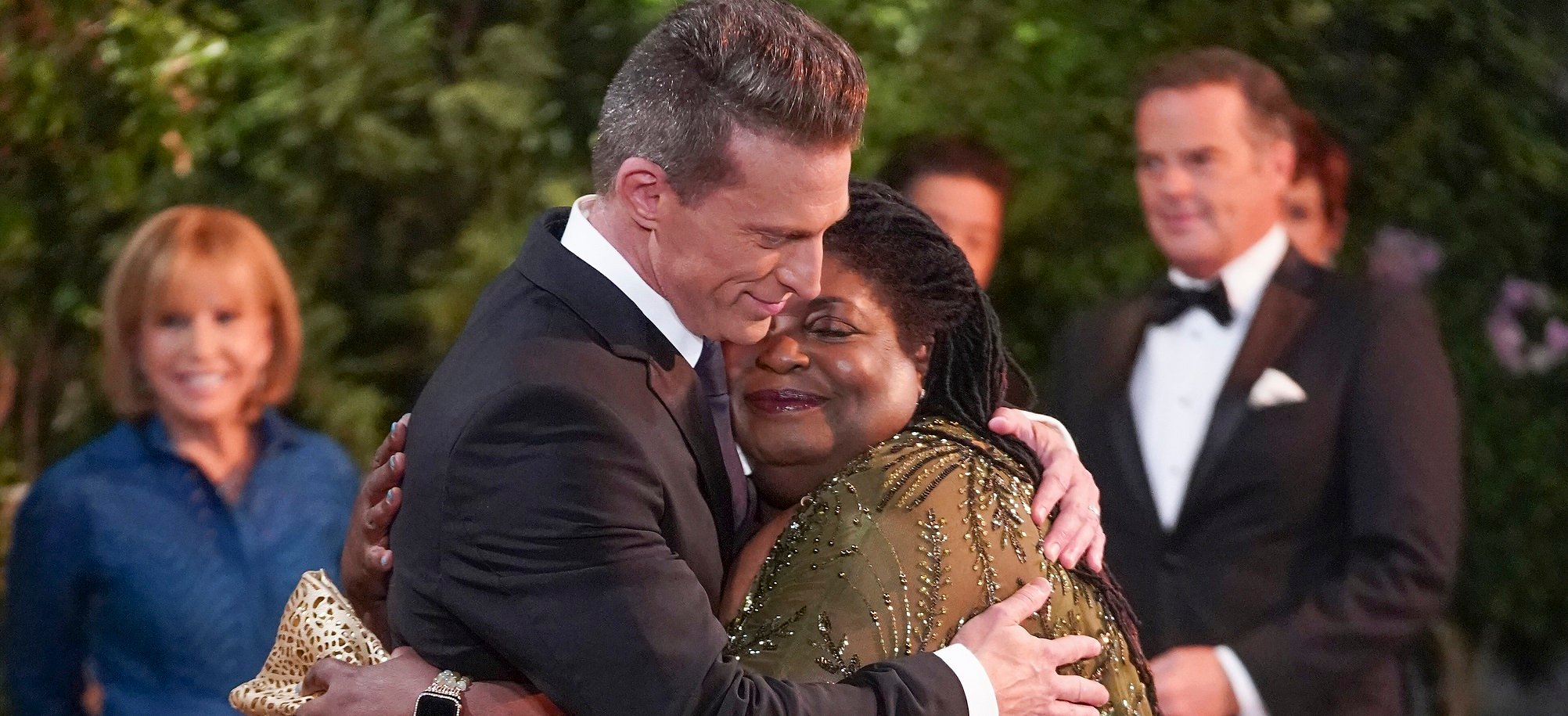 General Hospital news focuses on Steve Burton, pictured here in a tuxedo hugging a Black woman