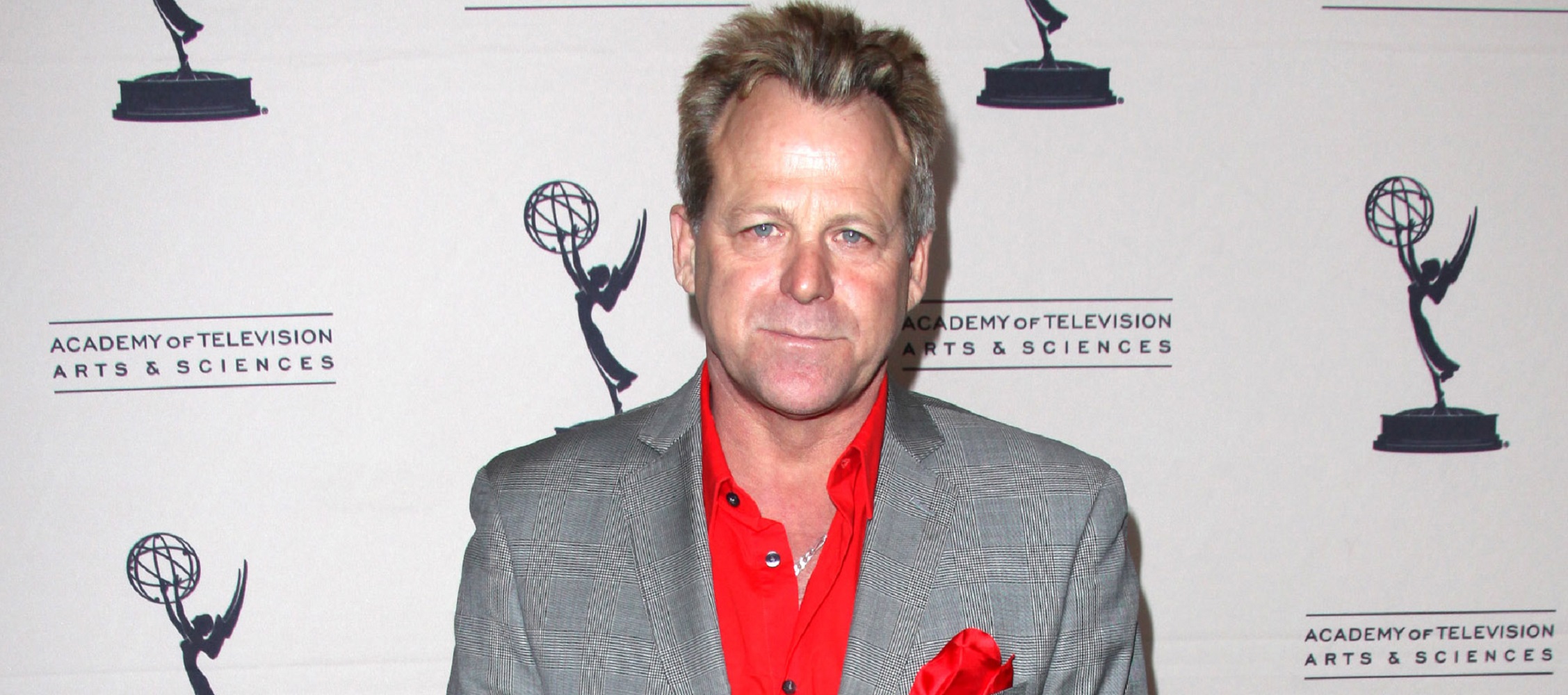 General Hospital weekly recap focuses on Scotty, portrayed by Kin Shriner, pictured here in a grey jacket and red shirt