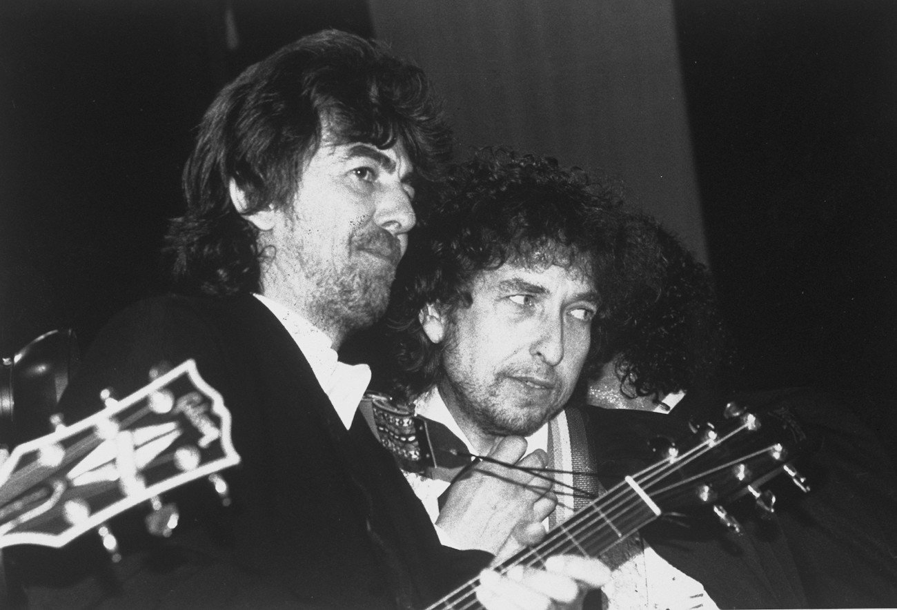 George Harrison and Bob Dylan performing at the Rock & Roll Hall of Fame inductions, 1988.