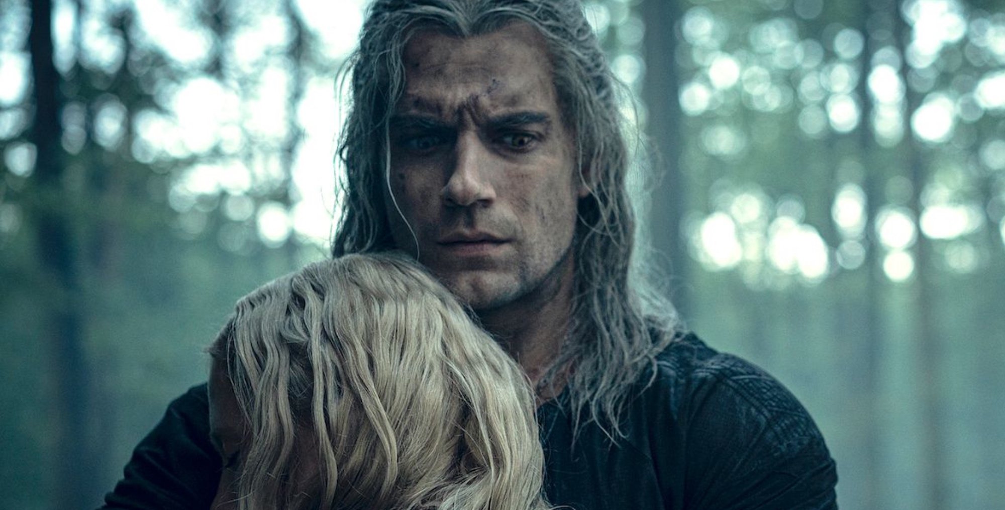 Geralt and Ciri from 'The Witcher' Season 1 embracing in the forest