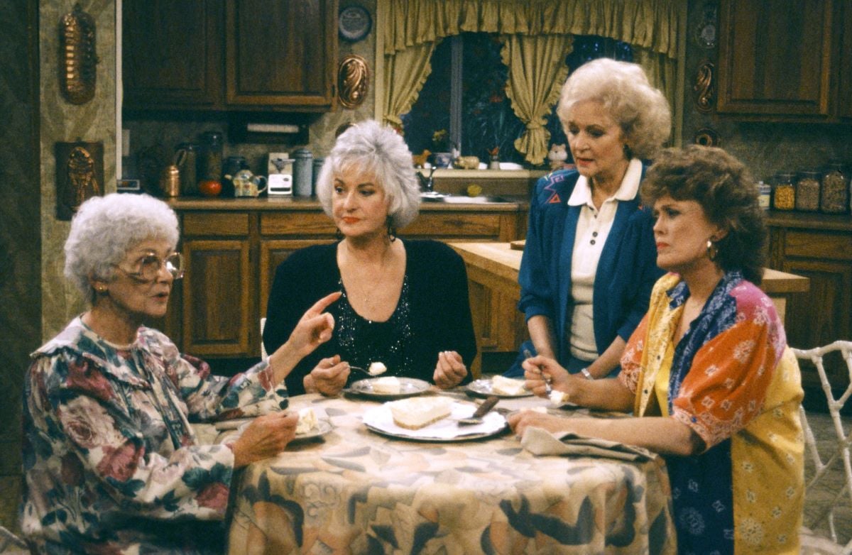 'The Golden Girls' (L-R) Estelle Getty, Bea Arthur, Betty White, and Rue McClanahan seated at a table