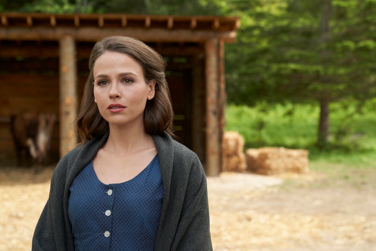 Grace, standing outside and looking serious, in 'When Hope Calls' Season 1