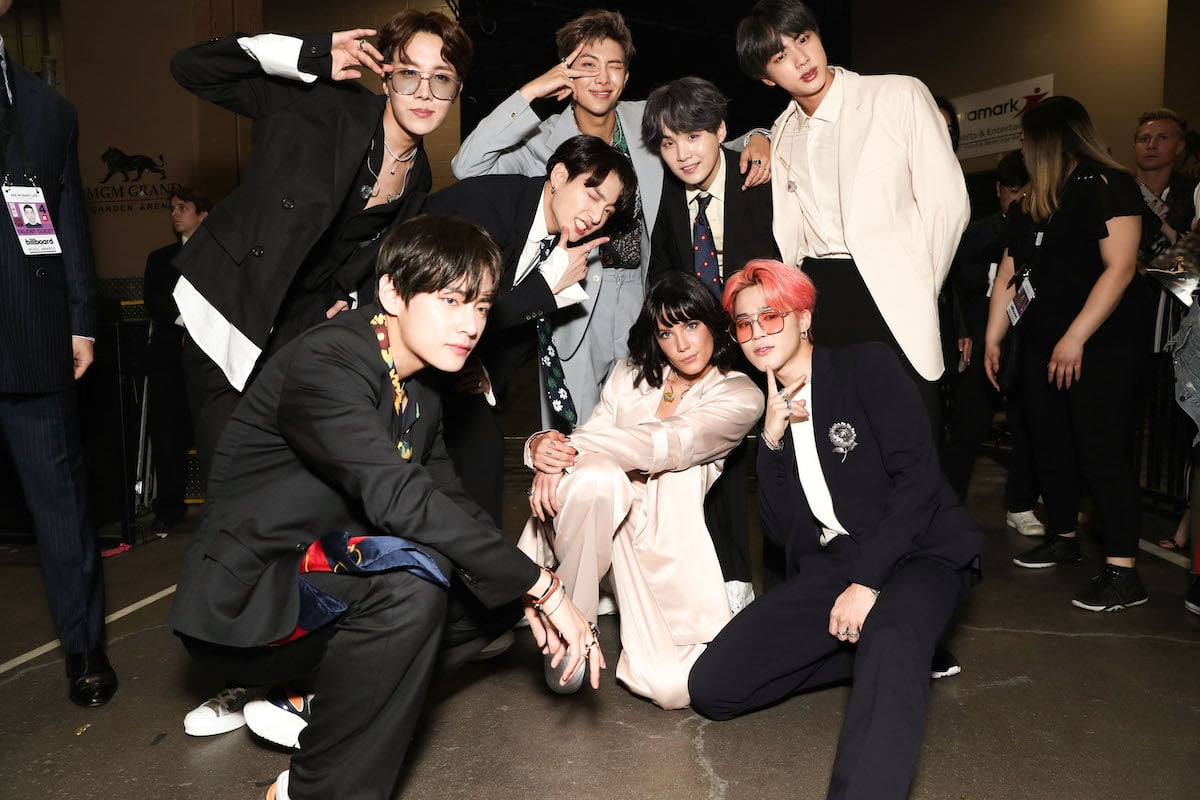 BTS and Halsey pose together.