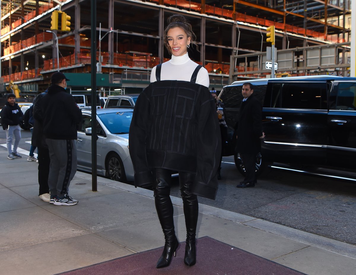 Hailee Steinfeld poses on a sidewalk in Manhattan.