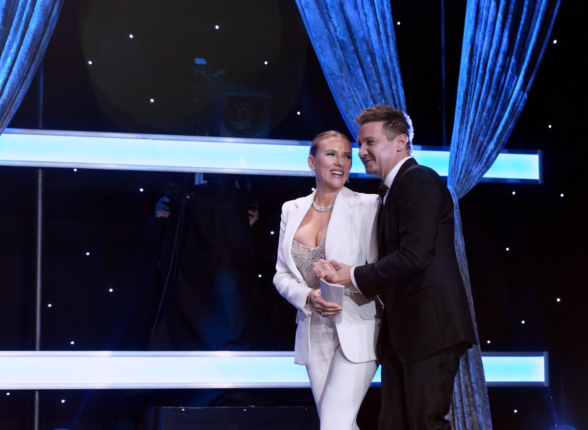 Scarlett Johansson and Jeremy Renner speak onstage during the 35th Annual American Cinematheque Awards in a picture for our article 'Did Hawkeye and Black Widow Date in Marvel Movies or Comics'